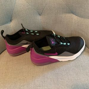 Size 11 toddler Nike running shoes .
